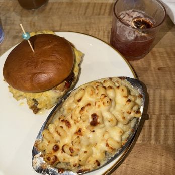 The Sage Mule - The sandwich - western style with impossible sausage and Mac and cheese and a pomegranate ginger margarita - Breakfast & Brunch Near Me - Greensboro, North Carolina The Sage Mule - The sandwich - western style with impossible sausage and Mac and cheese and a pomegranate ginger margarita - Breakfast & Brunch Near Me - Greensboro, North Carolina