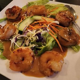 Grilled shrimp on a mixed green salad Grilled shrimp on a mixed green salad