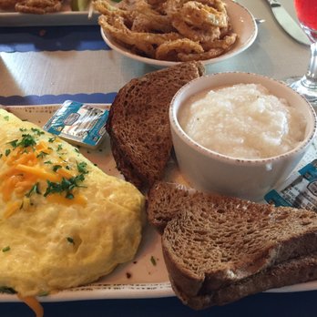 Blu Island Bistro - Bacon omelette with grits and berry iced tea - New American Near Me - Venice, Florida Blu Island Bistro - Bacon omelette with grits and berry iced tea - New American Near Me - Venice, Florida
