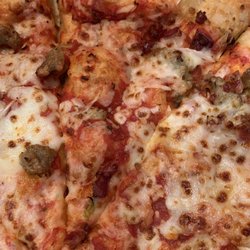 Sausage, bacon, and onion pizza