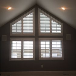 A Blind View - Wood shutters on angled arch