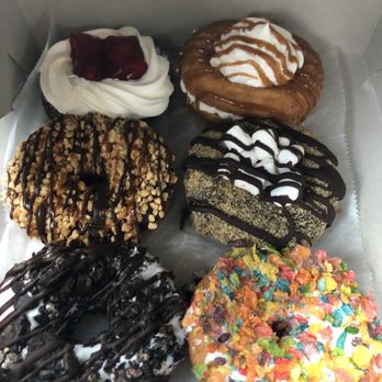 Doughology - Babylon - Top left down - raspberry cheesecake, snickers, Oreo, churro, s'mores & fruity pebbles - Donuts Near Me - Babylon, New York