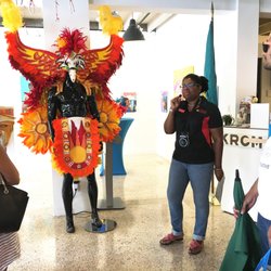 Cultural Heritage Alliance for Tourism - Tour guide Sandy sharing the Bahamian Goombay culture with tour guests in Coconut Grove Village West