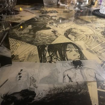 Wild Orange - A bespoke bar top made with a samurai manga collage. - Cocktail Bars Near Me - Honolulu, Hawaii Wild Orange - A bespoke bar top made with a samurai manga collage. - Cocktail Bars Near Me - Honolulu, Hawaii