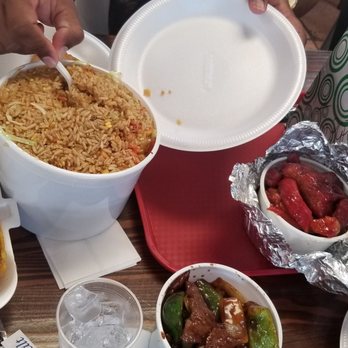 Confianza China - A view from above, a bucket of fried rice, garlic plantains, the best, boneless sweet ribs and pepper steak. Food for a family of 6. - Chinese Near Me - Carolina, Puerto Rico Confianza China - A view from above, a bucket of fried rice, garlic plantains, the best, boneless sweet ribs and pepper steak. Food for a family of 6. - Chinese Near Me - Carolina, Puerto Rico