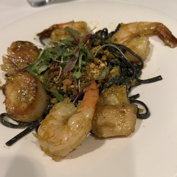 Peohe's - Chefs creation - squid ink pasta with scallops and shrimp. - Seafood Near Me - Coronado, California Peohe's - Chefs creation - squid ink pasta with scallops and shrimp. - Seafood Near Me - Coronado, California