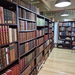 Kurt Gippert Bookseller - An array of leather bindings and other books.