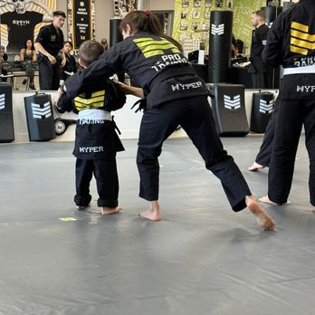 Hyper Pro Training Center - Always helping the kids with little tweaks to help improve their technique and form. - Karate Near Me - Huntington Beach, California