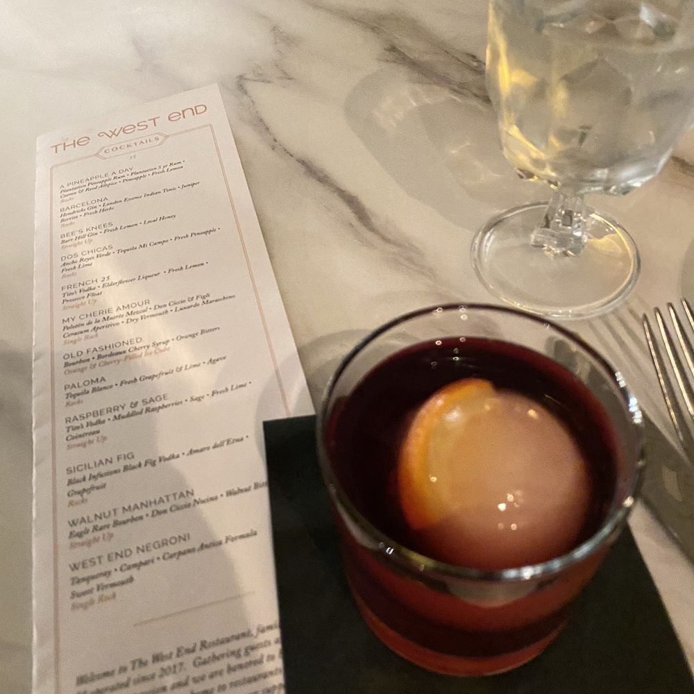 The West End - Old Fashion w/orange & cherry in circular ice cube. - New American Near Me - Hyannis, Massachusetts The West End - Old Fashion w/orange & cherry in circular ice cube. - New American Near Me - Hyannis, Massachusetts
