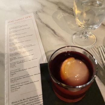 The West End - Old Fashion w/orange & cherry in circular ice cube. - New American Near Me - Hyannis, Massachusetts