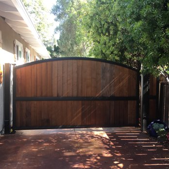 Los Gatos Iron Works - Automatic gate with redwood inserts - Fences & Gates Near Me