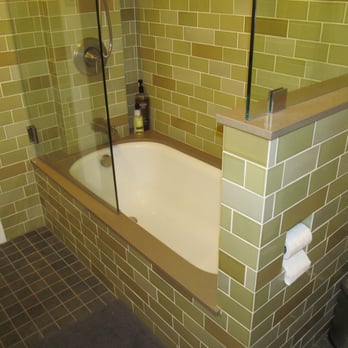 Harmony Tile and Marble - a bathtub and shower - General Contractors Near Me - Alameda, California
