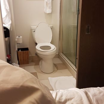 EVEN Hotel Brooklyn - The view from bed, the toilet sliding not sealed door is right opposite the pillow. Who designed it???? - Hotels Near Me - Brooklyn, New York