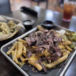 Blackhorse Mercantile & Cafe - Popular menu item - loaded brisket fries! All BBQ slow smoked in house and so tender!