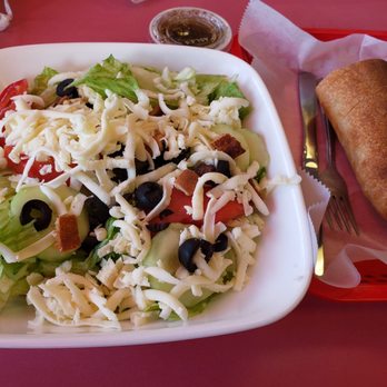 Capri Pizza & Sub Express - Tossed salad without onions, add cucumbers. Home made Italian vinaigrette and bread on the side - Pizza Near Me - Glen Burnie, Maryland Capri Pizza & Sub Express - Tossed salad without onions, add cucumbers. Home made Italian vinaigrette and bread on the side - Pizza Near Me - Glen Burnie, Maryland