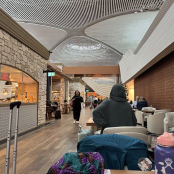 Turkish Airlines Lounge - A view of the lounge with a food kiosk on the left - Airport Lounges Near Me - Istanbul, 34