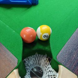 The pockets are tight on the pool tables here.