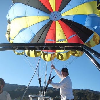 Parasail Catalina - Setting up the parachute on the boat before takeoff - Parasailing Near Me - Avalon, California Parasail Catalina - Setting up the parachute on the boat before takeoff - Parasailing Near Me - Avalon, California