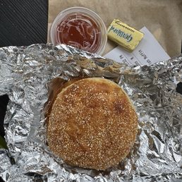 Toasted English Muffin with butter and jam Toasted English Muffin with butter and jam