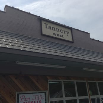 Tannery Downtown - a woman standing in front of a restaurant - Delis Near Me - Greeneville, Tennessee