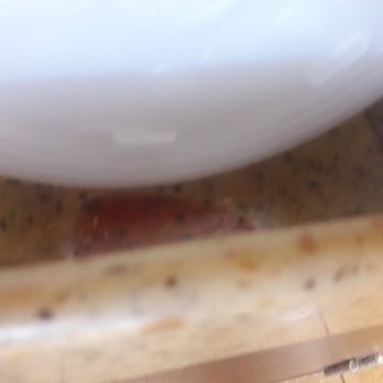 Jack in the Box - Disgusting, dried soda spills in the drink lid dispensers. - Fast Food Near Me - Austin, Texas