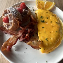 Cheese omelette with bacon and waffles ($20) Cheese omelette with bacon and waffles ($20)