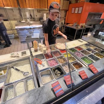 Blaze Pizza - Toppings station to build your own pizza. - Pizza Near Me - Pasadena, California