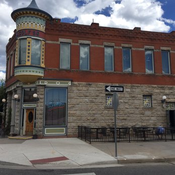Brooklyn's - Invesco Field - a brick building with a clock tower - Sports Bars Near Me - Denver, Colorado