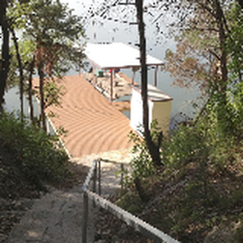 A & D Construction - a boat dock on a lake - General Contractors Near Me