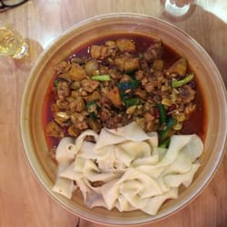 Gogo Music Cafe - This is the real deal hahaha. Xinjiang style chicken with hand made noodles. This is the small size. 40cm to 50cm in diameter!!!