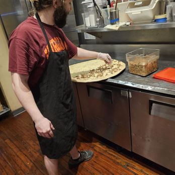 Benny Marconi's - The second employee making the pizza dough with the cheese. - Italian Near Me - Roanoke, Virginia Benny Marconi's - The second employee making the pizza dough with the cheese. - Italian Near Me - Roanoke, Virginia
