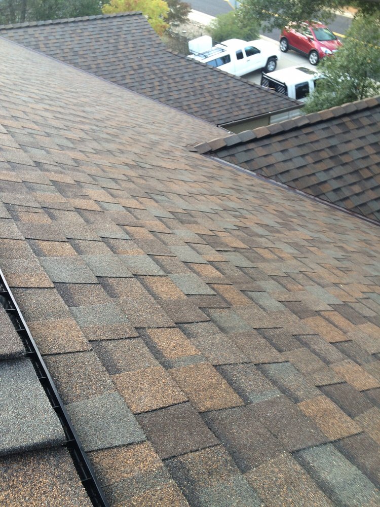 Slide of Kelly Roofing