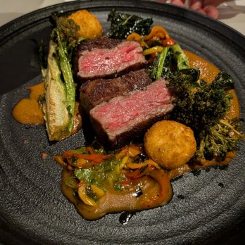 THE CHASTAIN - Prime Spinalis. $65. Olive oil fried brassicas, chevre croquettes, black garlic romesco, grilled sweet peppers. - Diners Near Me - Atlanta, Georgia THE CHASTAIN - Prime Spinalis. $65. Olive oil fried brassicas, chevre croquettes, black garlic romesco, grilled sweet peppers. - Diners Near Me - Atlanta, Georgia