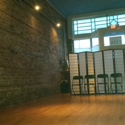 Rhythmic Arts Center - Gorgeous brick wall opposite the wall of mirrors