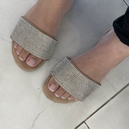 All the lady did was wet my feet , didn't even clean under my nails at that , to charge $10 to leave due to their horrible service All the lady did was wet my feet , didn't even clean under my nails at that , to charge $10 to leave due to their horrible service