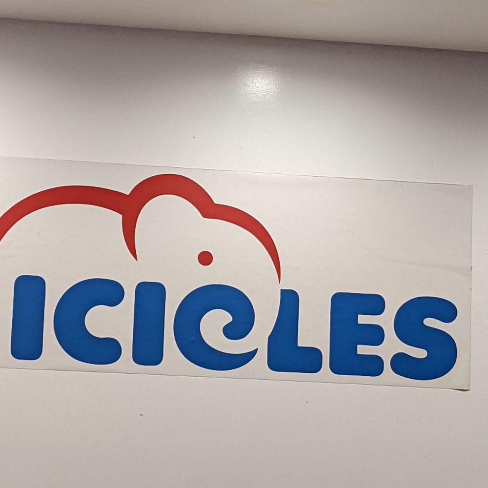 Icicles - two people standing in front of a sign - Desserts Near Me - Newark, California Icicles - two people standing in front of a sign - Desserts Near Me - Newark, California