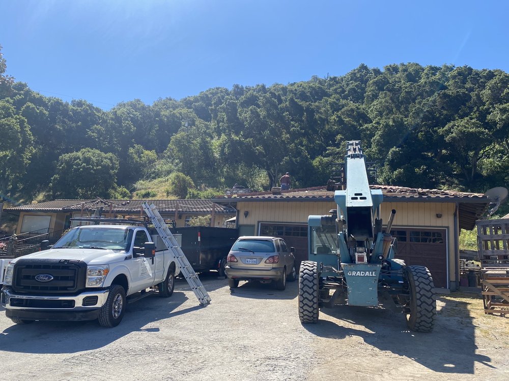 Slide of McGraw and Sons Roofing
