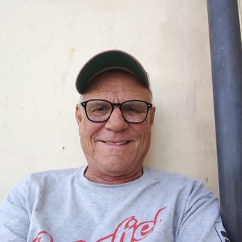 Chico - a man wearing glasses and a baseball cap - Dance Clubs Near Me - Montebello, California