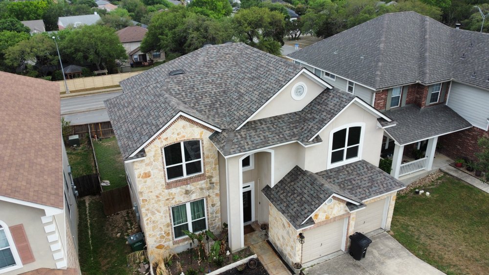 Slide of Design Roofing & General Contractors