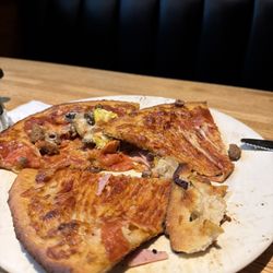 Copper River Grill - Burnt pizza. Terrible flavor on insides