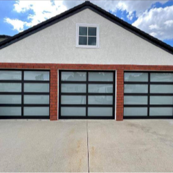 Prodigious Garage Door Repair - Prodigious Garage Door Repair's photo showcases a modern residential garage with three newly installed frosted glass doors in...