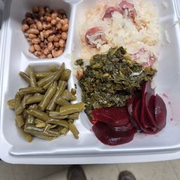 Great vegetable dishes to choose from.     Green beans, Black eyed peas, beats, and turnip greens.  Served with my favorite, Sauerkraut.