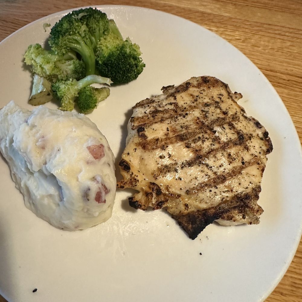 Grilled chicken. The plate looks a little bare huh. Perhaps more broccoli would have helped. Grilled chicken. The plate looks a little bare huh. Perhaps more broccoli would have helped.