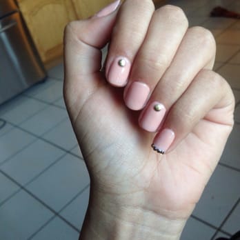 Ciel Nail Spa - Muted pink polish w/two studs and rhinestones along pinky. - Nail Salons Near Me - Northridge, California