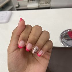 4 Seasons Nails & Spa - Hot pink with a chrome heart!