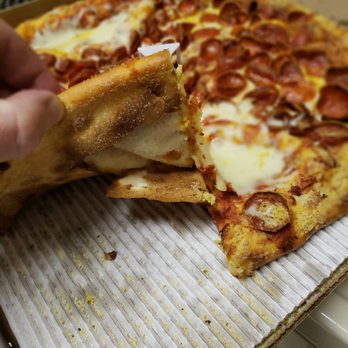Marco's Pizza - Top and bottom separating due to large air bubbles. Just a trashy product. - Pizza Near Me - Tucson, Arizona