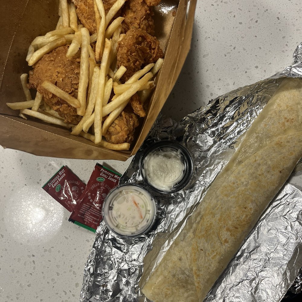 4 pc fried chicken with fries, coleslaw, chicken shawarma & sauces 4 pc fried chicken with fries, coleslaw, chicken shawarma & sauces