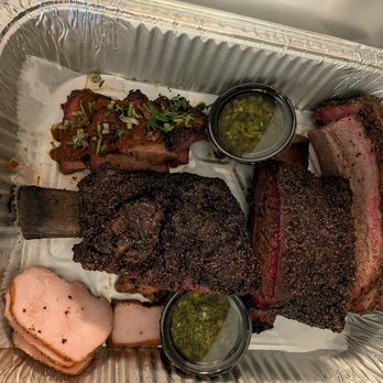 Interstellar BBQ - Clockwise from upper left - lengua(beef tongue), beef brisket, beef short rib with chimichurri, & Tipsy Turkey - Barbeque Near Me - Austin, Texas