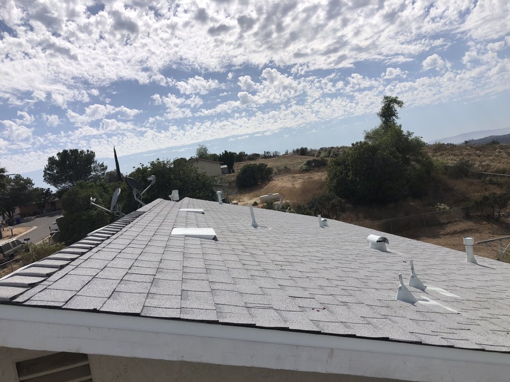 Slide of Escamilla’s Roofing and Rain Gutters