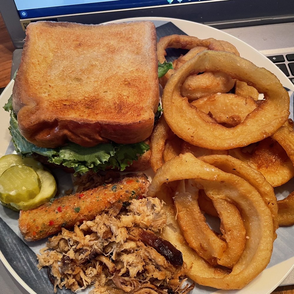 Burger Tavern 77 - Finishing up some work and enjoying a well made char grilled burger - Burgers Near Me - Columbia, South Carolina Burger Tavern 77 - Finishing up some work and enjoying a well made char grilled burger - Burgers Near Me - Columbia, South Carolina